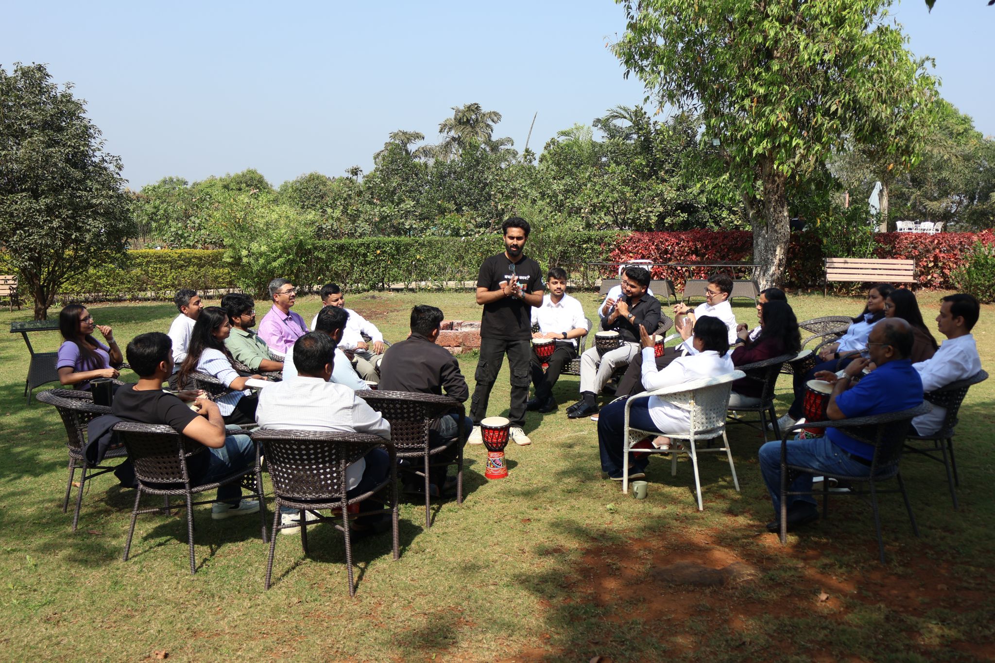The NavAI team playing drums together outdoors.